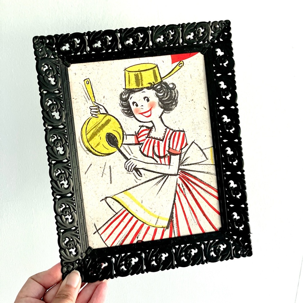 Vintage 50’s black plastic filigree framed illustration lady in kitchen wall art